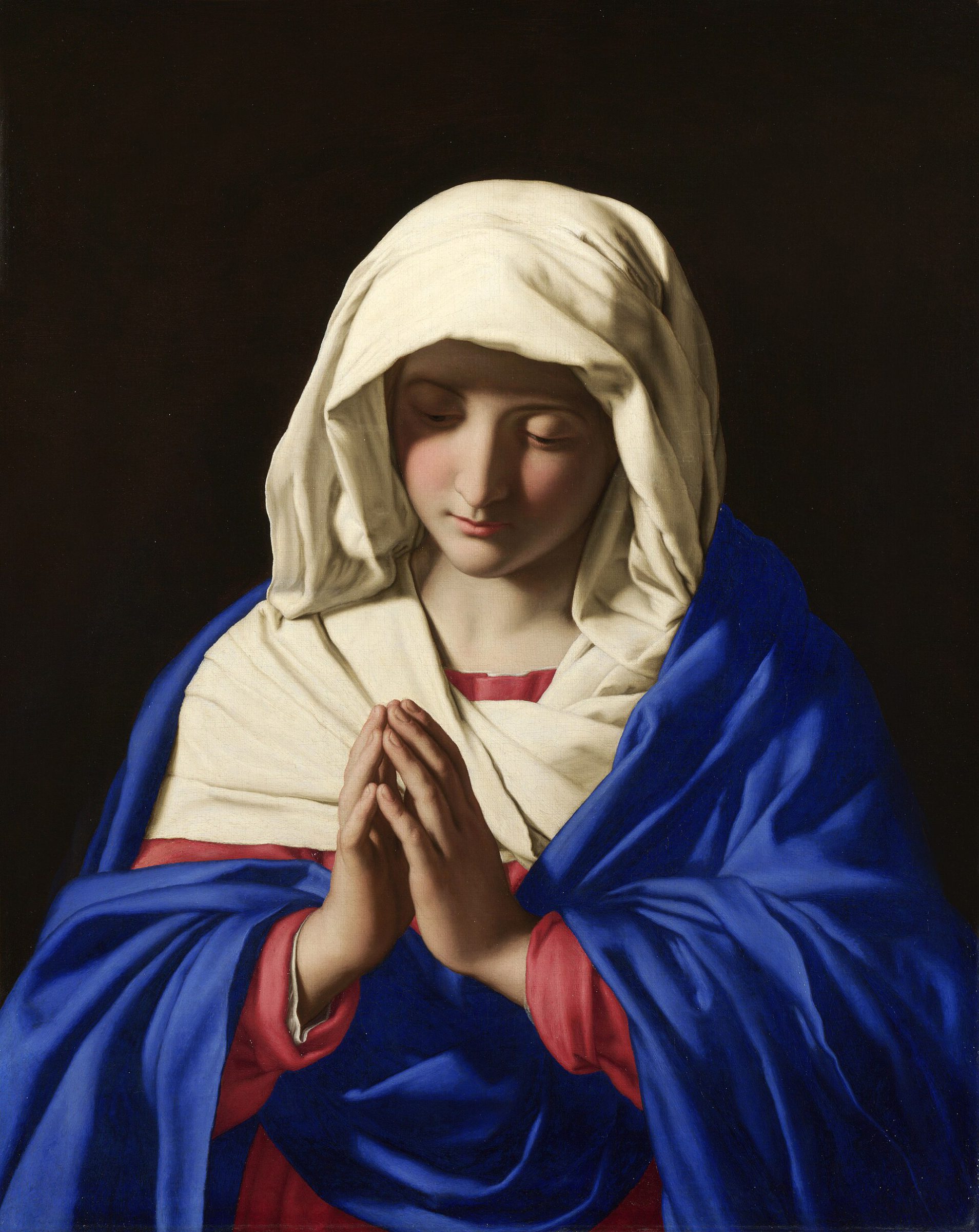The Virgin Mary with folded hands in prayer
